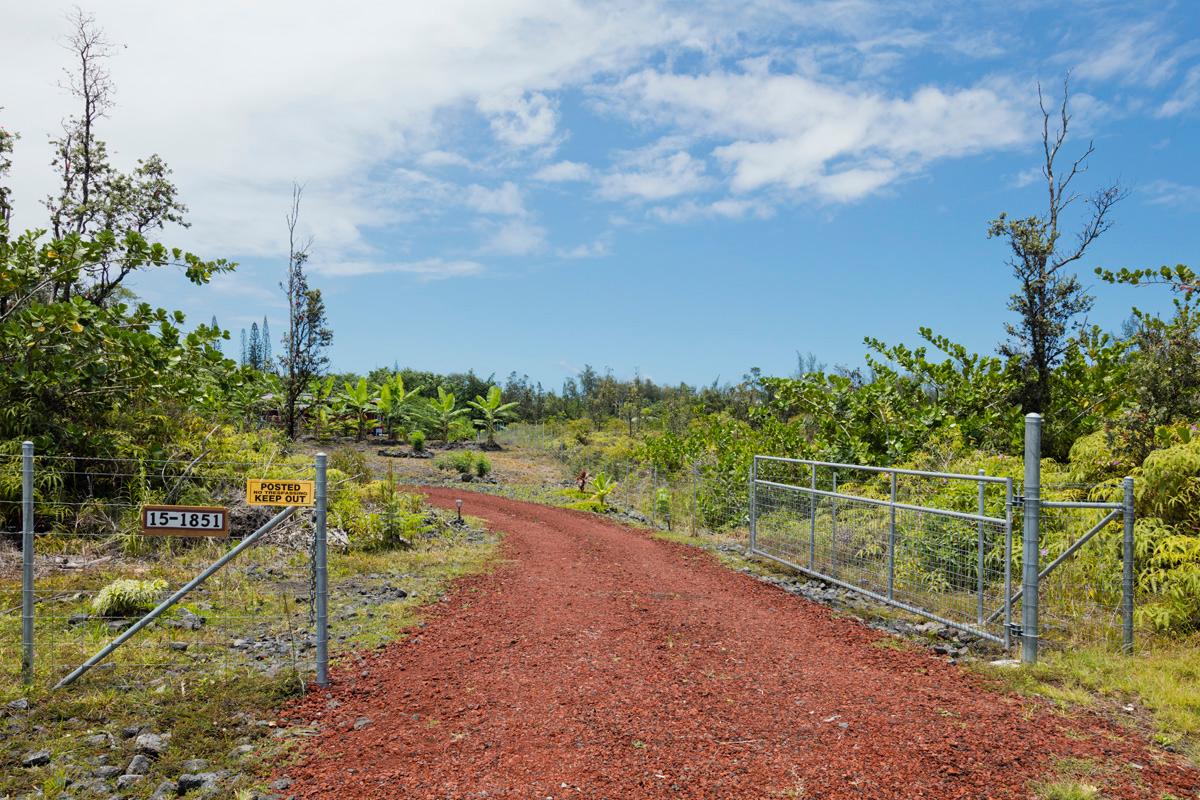 property is completely fenced and has a 14 ft wide gate